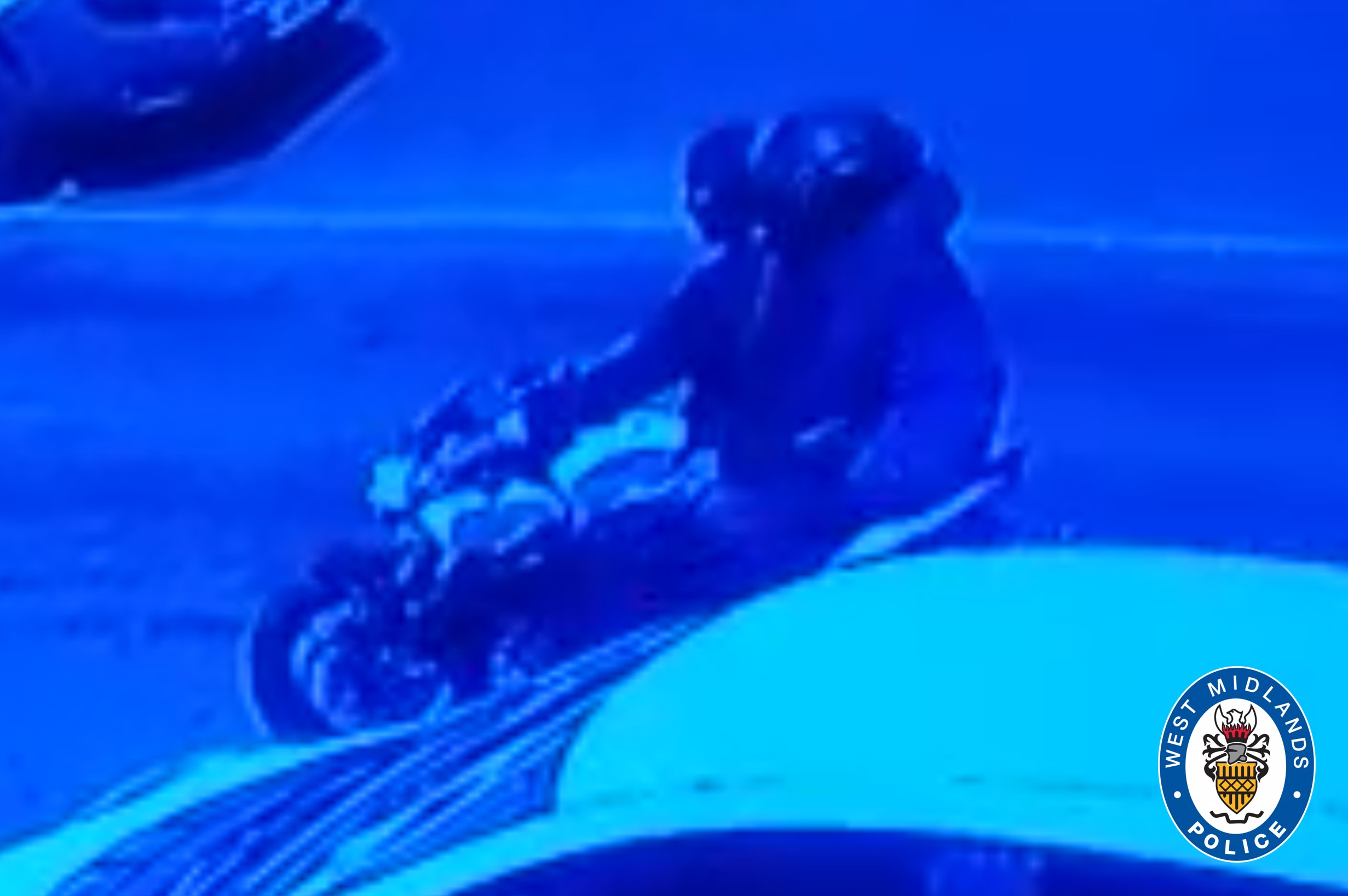 two men on a motorbike
