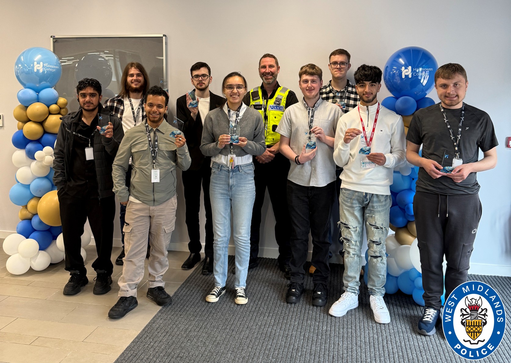 Group image of PC with students at awards ceremony