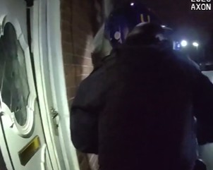 Officers carrying out a warrant