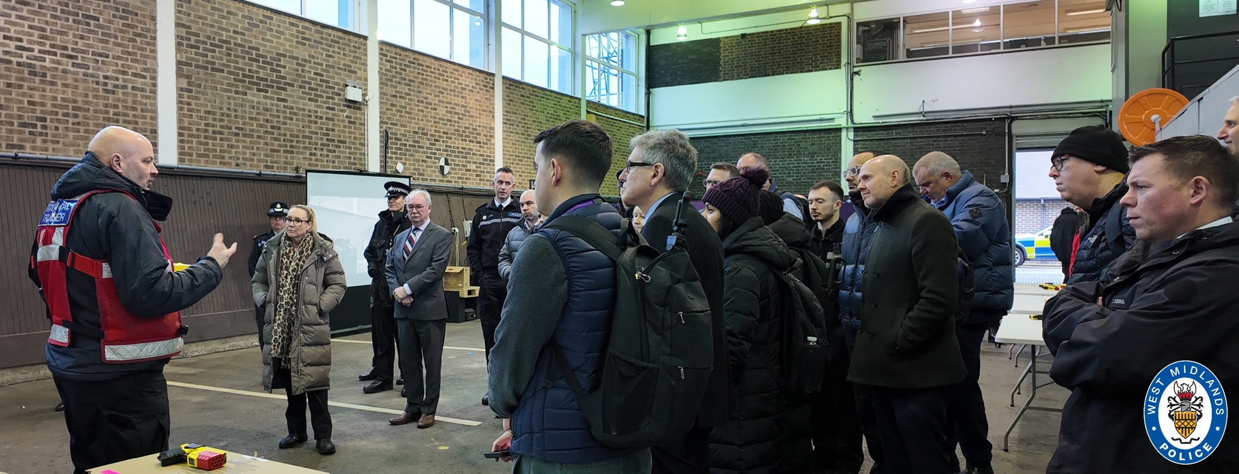 Officers hearing about the new taser 