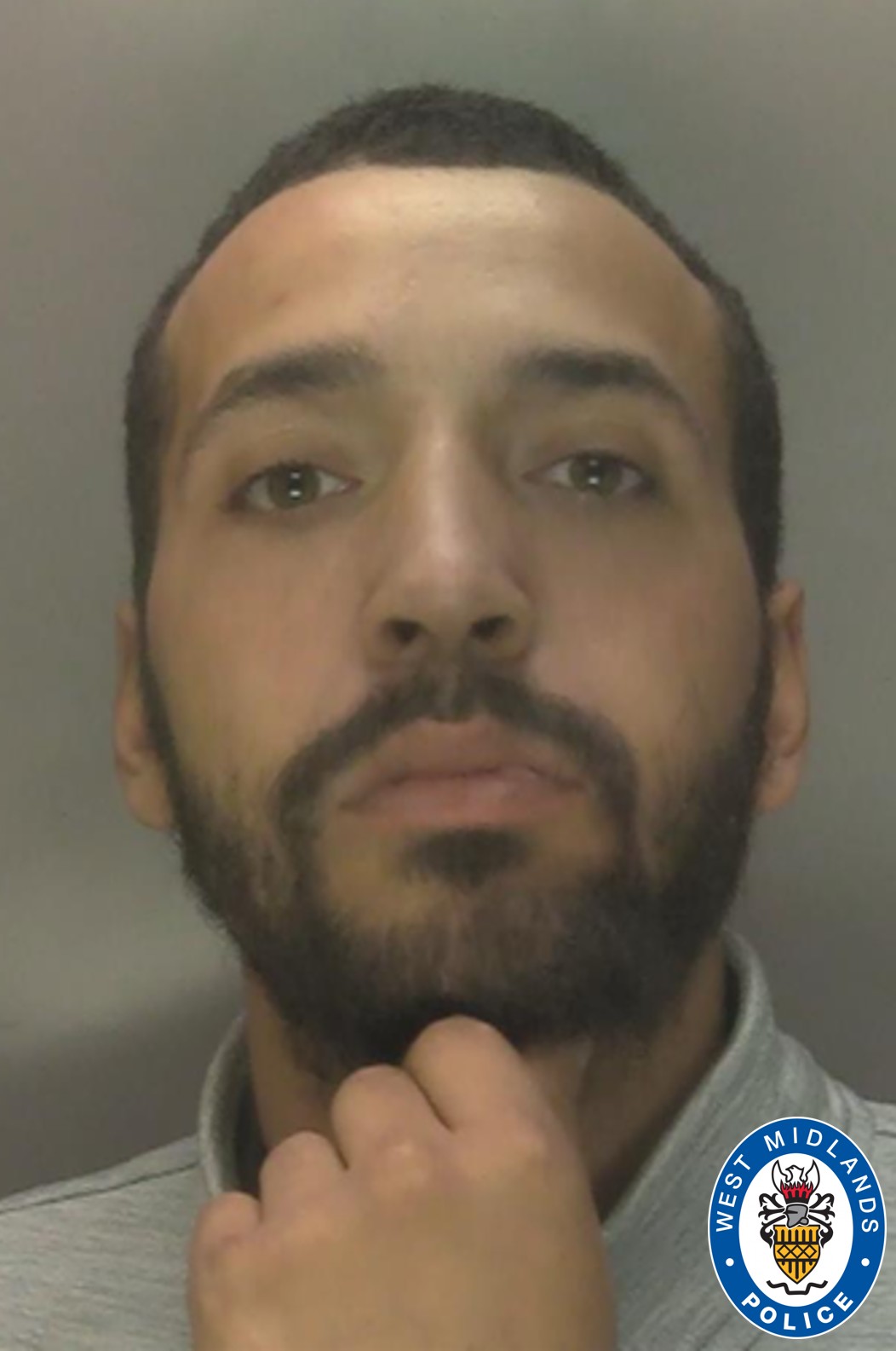 Custody image of Omar Khan
