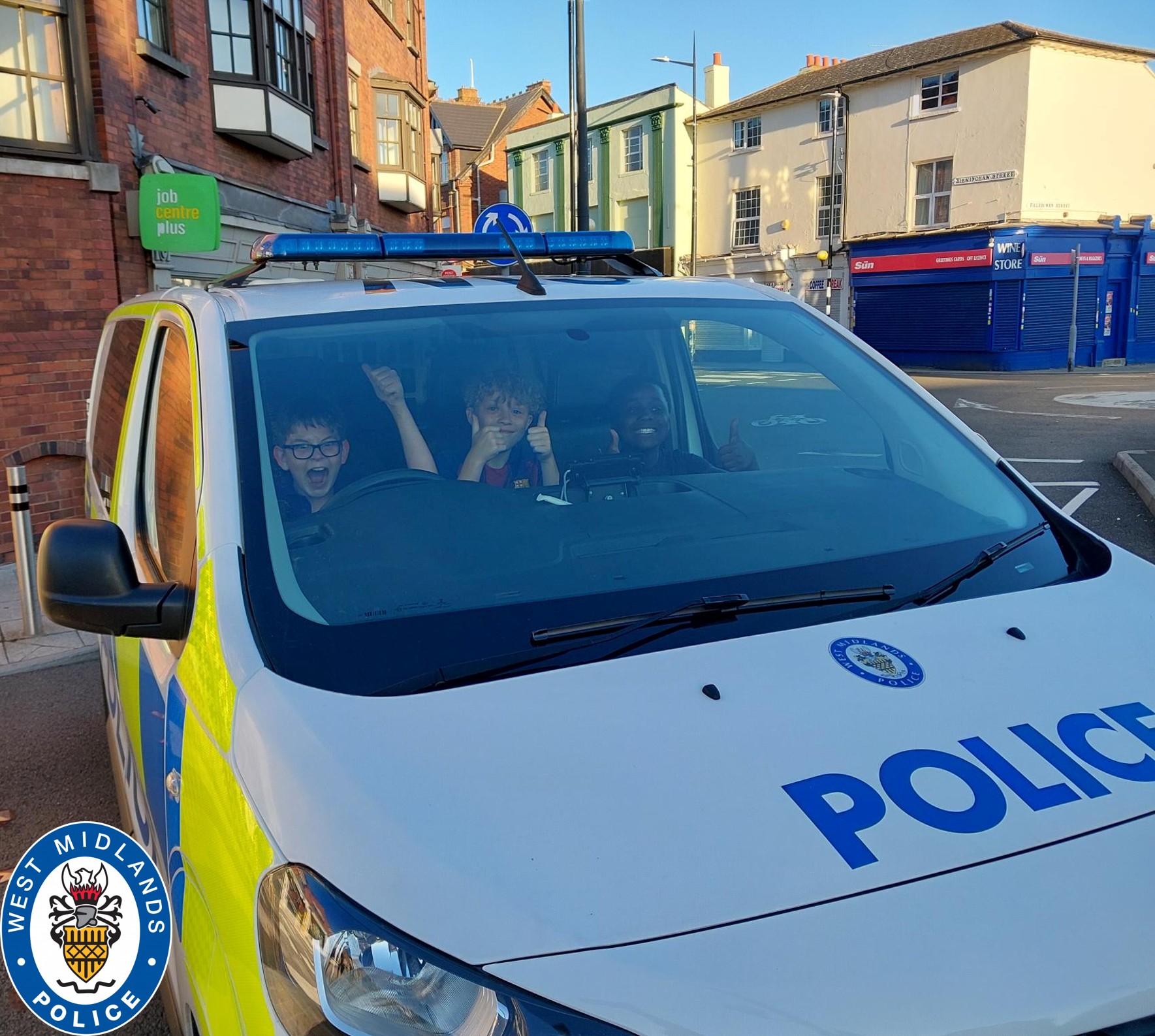 Children in police car
