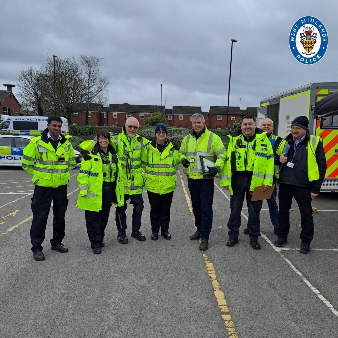 officers and partners posing for a photo