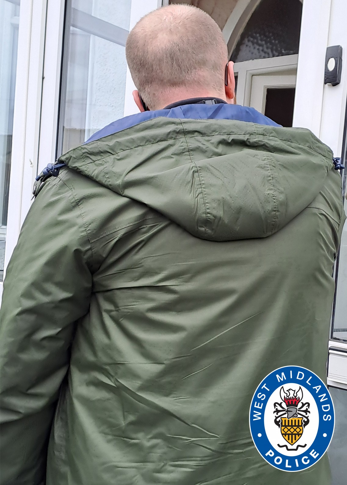 image of officer at a door