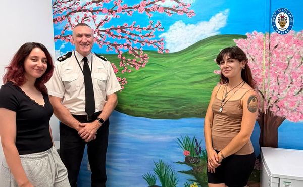 Commander Paul Joyce with students from Cov Uni