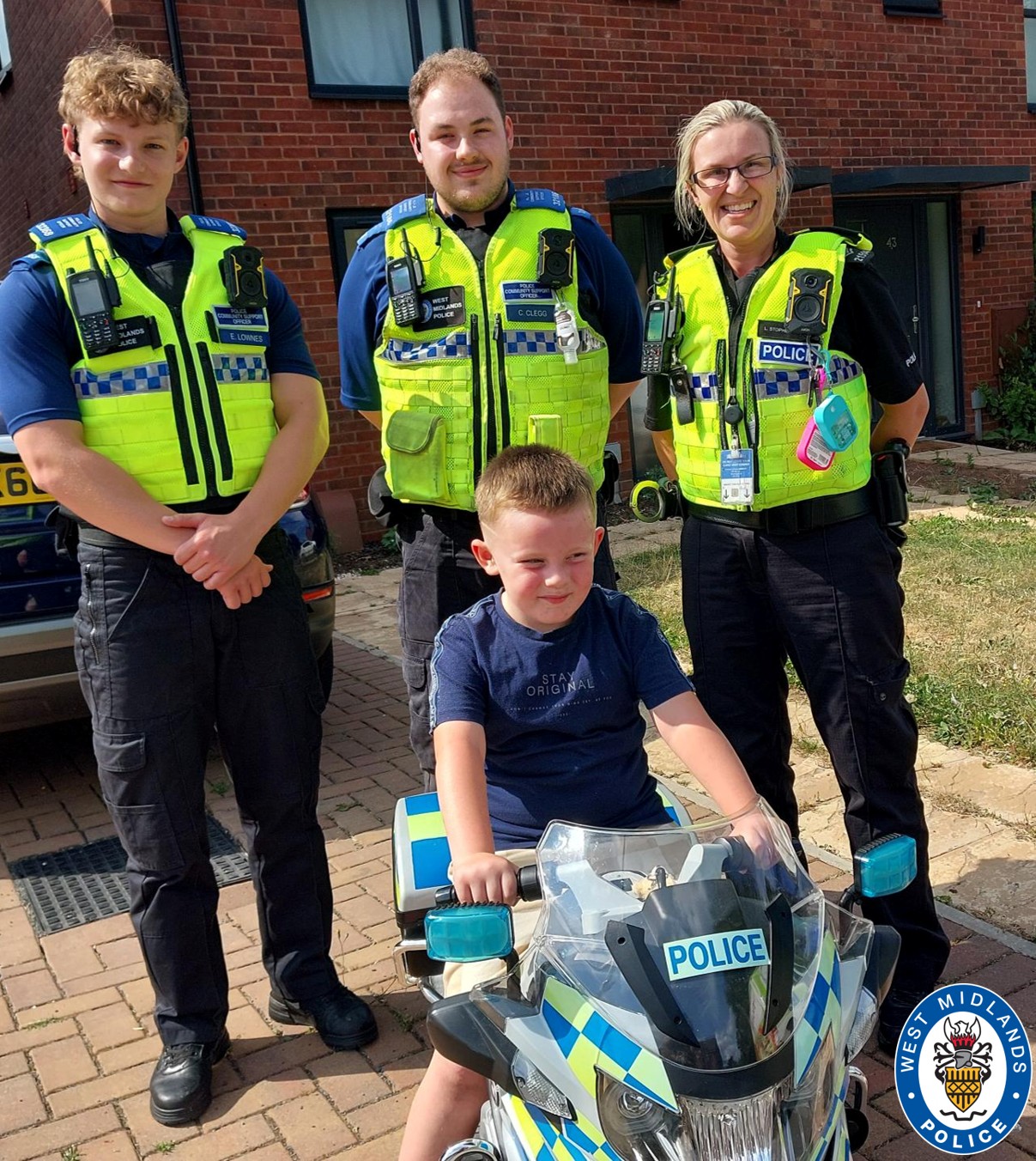 Jaxon on bike in front of Stourbridge officers
