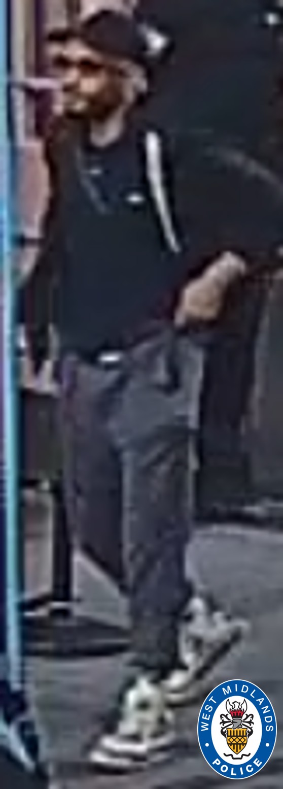 CCTV image of man wearing a black hoodie, black cap with a beard and sunglasses
