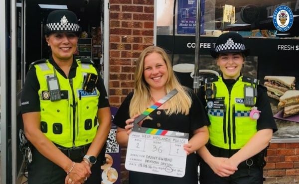 police officers and film slate