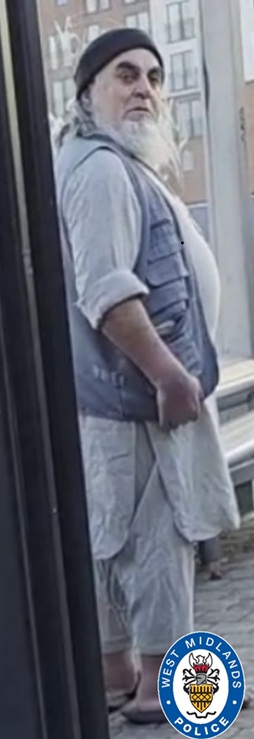 CCTV image of a man stood outside 
